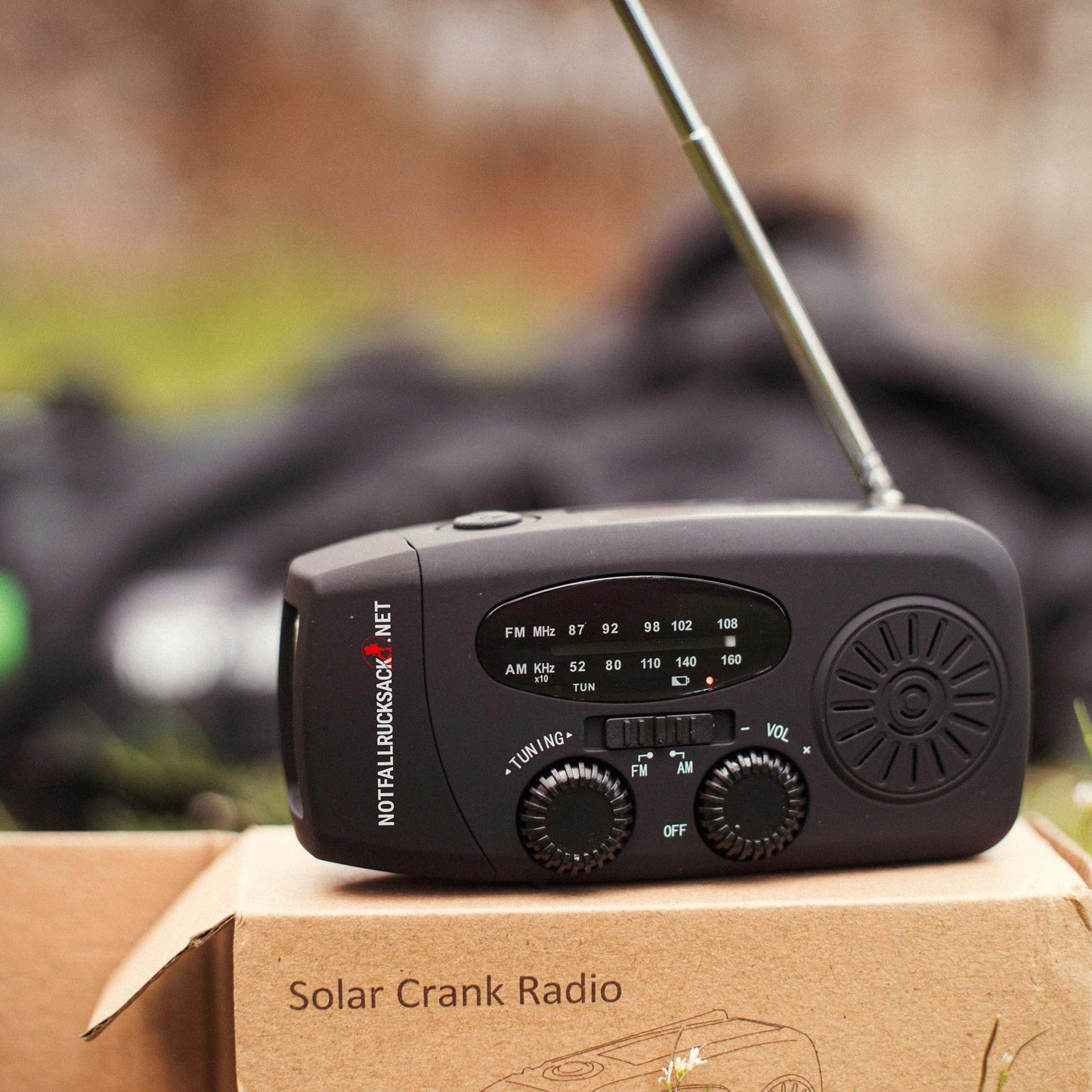 Solar radio with lamp crank and solar drive